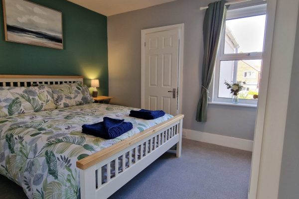 Curlew Cottage main bedroom | Suffolk Coastal Escapes | dog friendly self catering accommodation on the Suffolk coast.tering accommodation on the Suffolk coast.